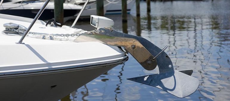 Boat anchor windlass and anchor system at the bow