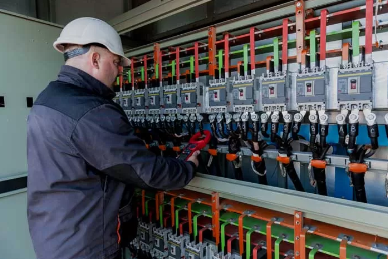 Marine technician troubleshooting boat electrical system for a windlass
